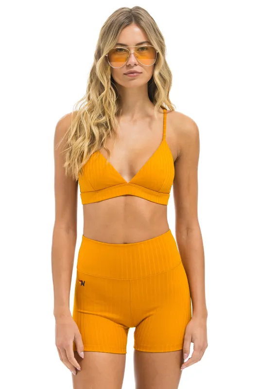 WIDE RIB TRIANGLE ADJUSTABLE SPORTS BRA - GOLD sold by Aviator Nation