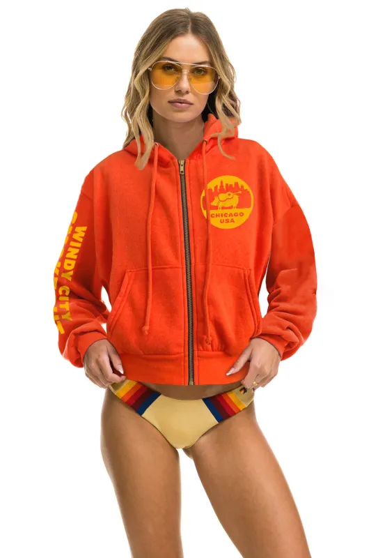 WINDY CITY SMOKEOUT 2025 CROPPED ZIP HOODIE RELAXED - ORANGE sold by Aviator Nation