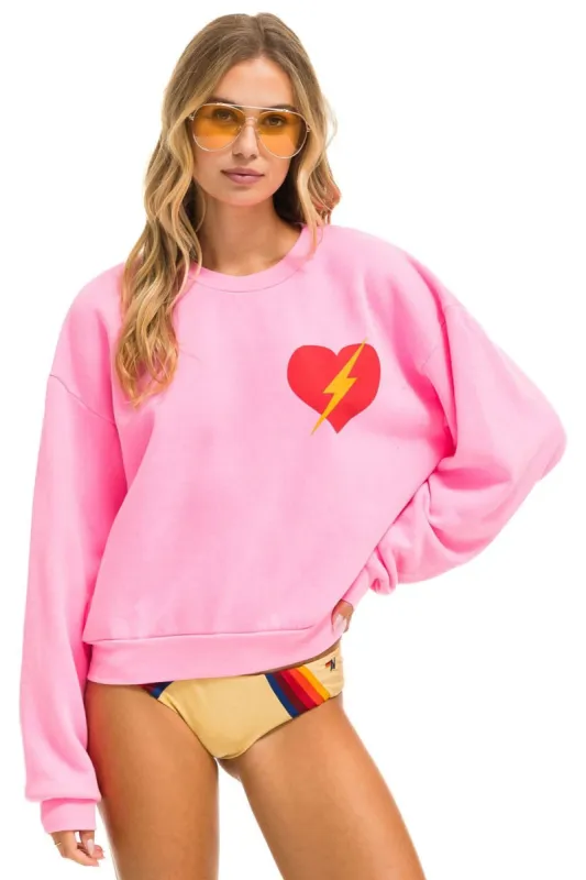 BOLT HEART RELAXED CREW SWEATSHIRT - NEON PINK made by Aviator Nation