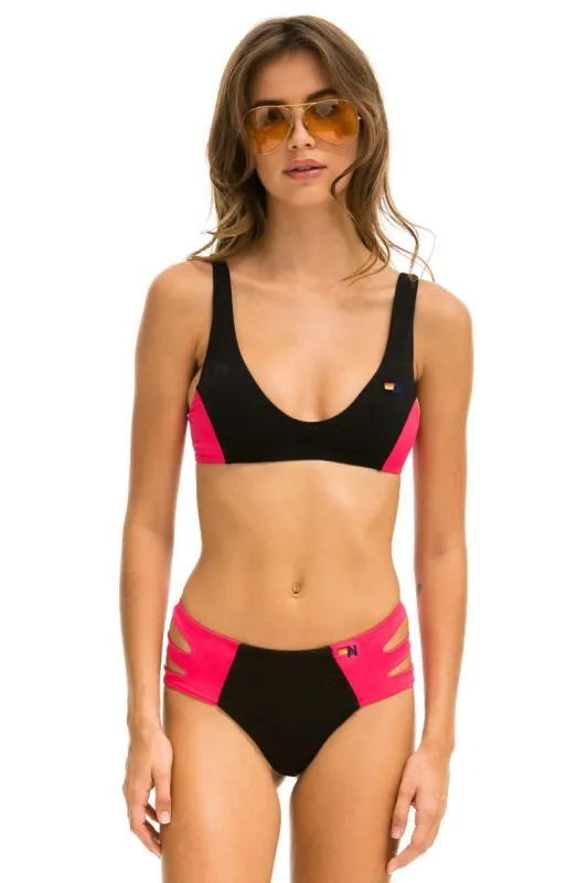 HI-WAISTED SIDE CUT OUT COLOR BLOCK FULL COVERAGE BRIEF BIKINI BOTTOMS - BLACK // RED sold by Aviator Nation
