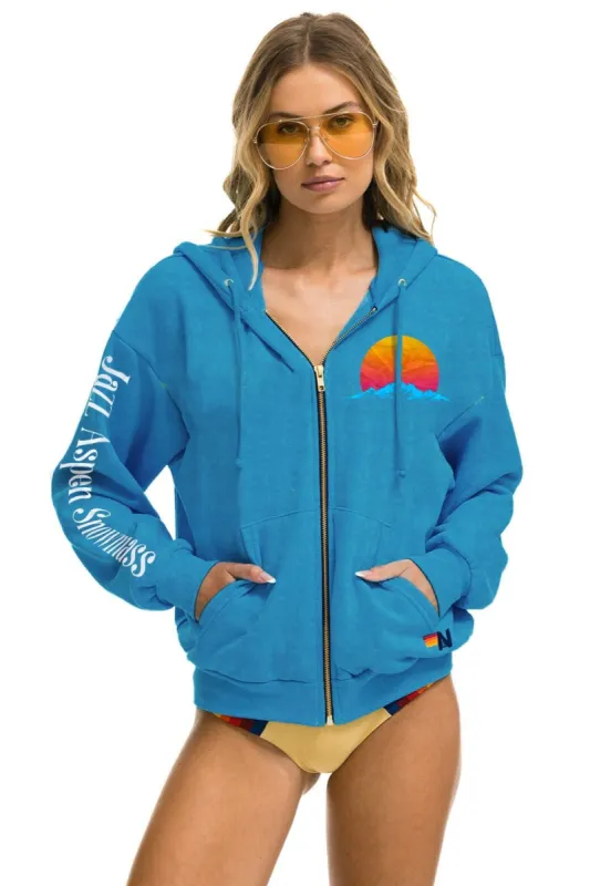 JAZZ ASPEN SNOWMASS 2023 RELAXED ZIP HOODIE - OCEAN sold by Aviator Nation