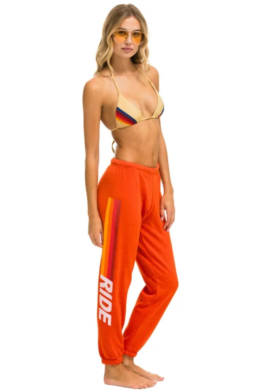 RIDE LOGO WHITE SWEATPANTS - ORANGE sold by Aviator Nation
