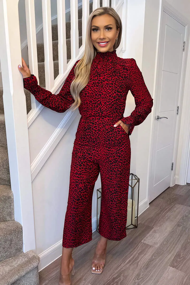 Red Animal Print Elasticated Neck Jumpsuit sold by AX Paris