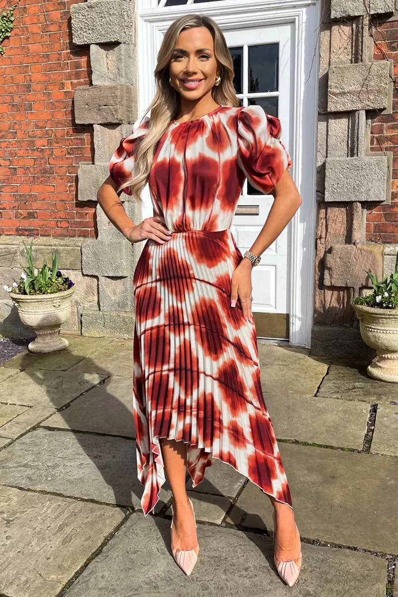 Rust Printed Puff Sleeve Zig Zag Hem Pleated Midi Dress sold by AX Paris
