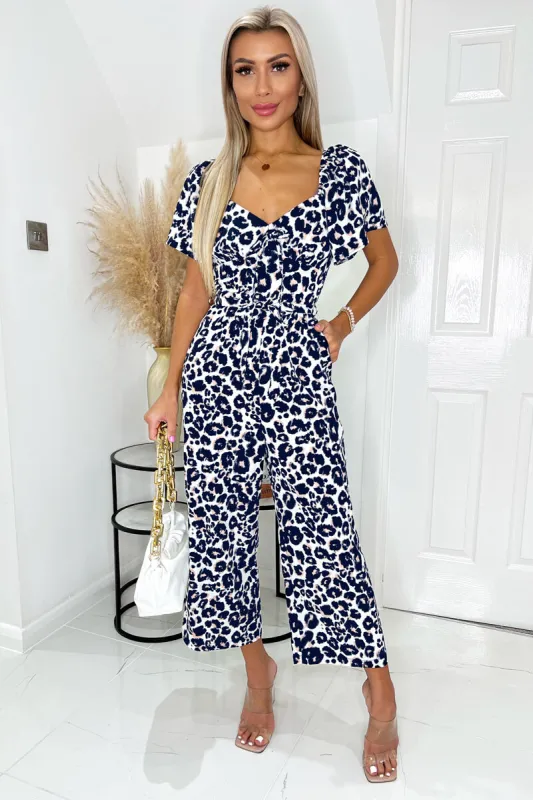Cream Pink And Navy Animal Print Short Sleeve Tie Front Jumpsuit sold by AX Paris