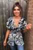 Black Tropical Wrap Top sold by AX Paris