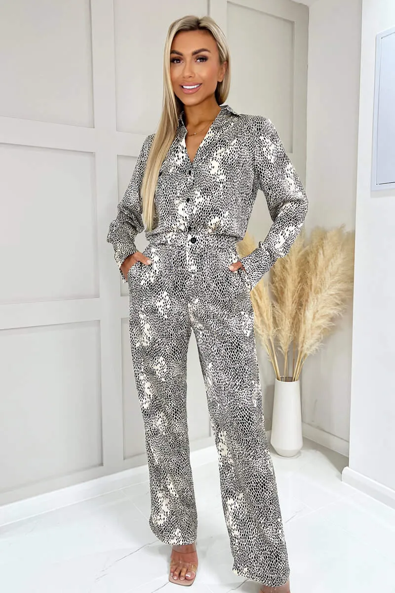 Stone And Black Printed Trousers sold by AX Paris