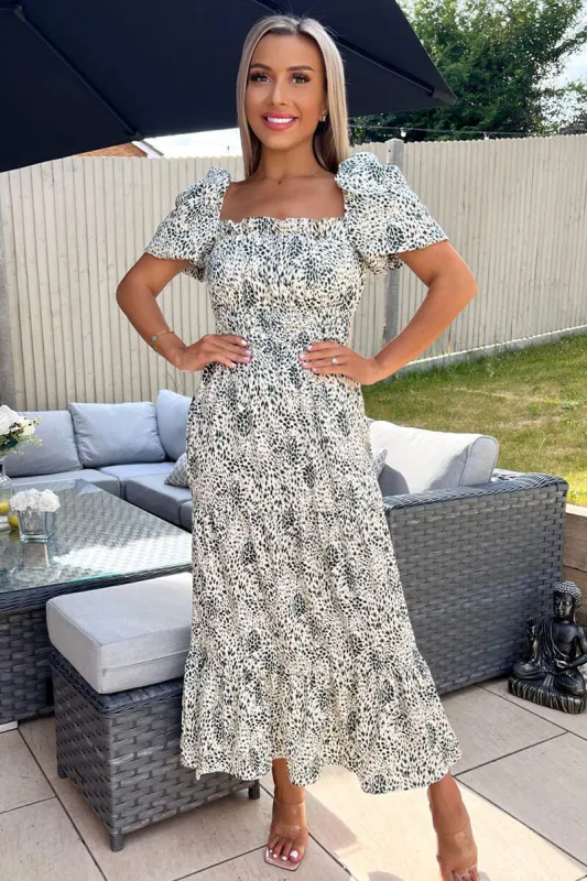 Cream And Green Printed Elasticated Midi Smock Dress sold by AX Paris