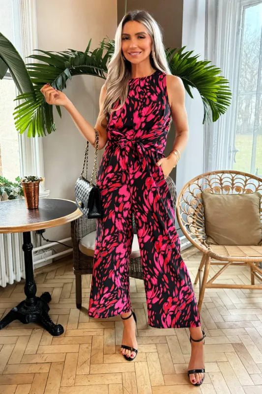 Pink And Black Printed Sleeveless Knot Front Jumpsuit sold by AX Paris