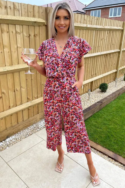 Red Abstract Wrap Over Jumpsuit sold by AX Paris