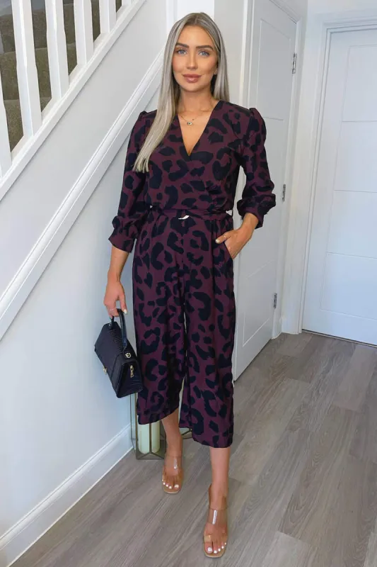 Plum And Black Printed Belted Long Sleeve Jumpsuit sold by AX Paris