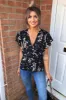 Black Floral Wrap Top sold by AX Paris