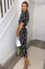 Black And White Printed Short Sleeve Jumpsuit sold by AX Paris