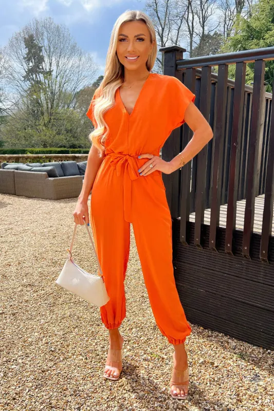 Burnt Orange V Neck Short Sleeve Belted Elasticated Cuff Jumpsuit sold by AX Paris
