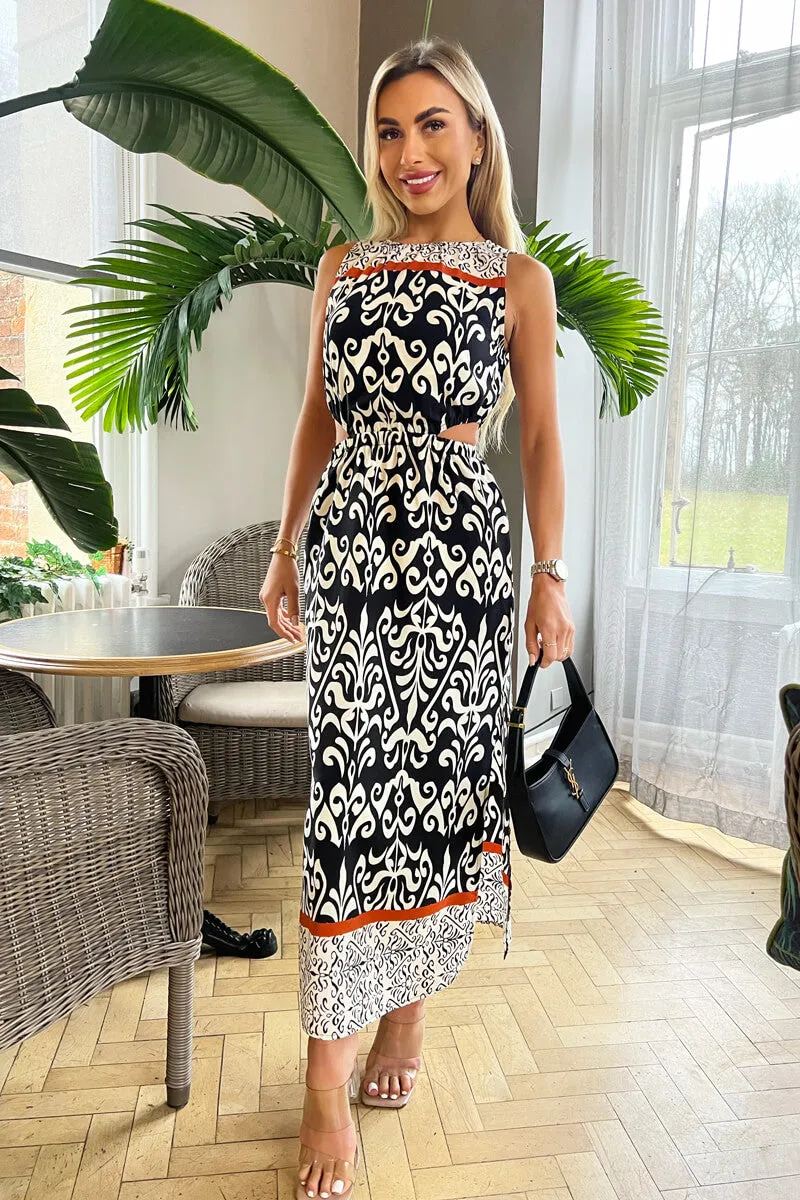 Black and Cream Printed Cut Out Waist Midi Dress sold by AX Paris
