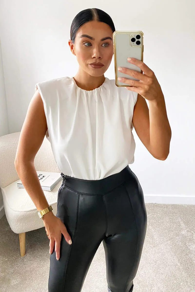 Cream Padded Shoulder Sleeveless Blouse sold by AX Paris