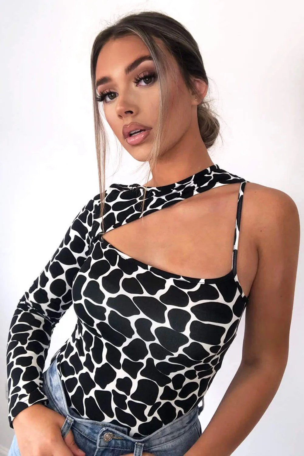 Black Printed One Shoulder Cut Out Bodysuit sold by AX Paris