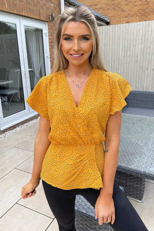 Yellow Polka Dot Wrap Over Top sold by AX Paris