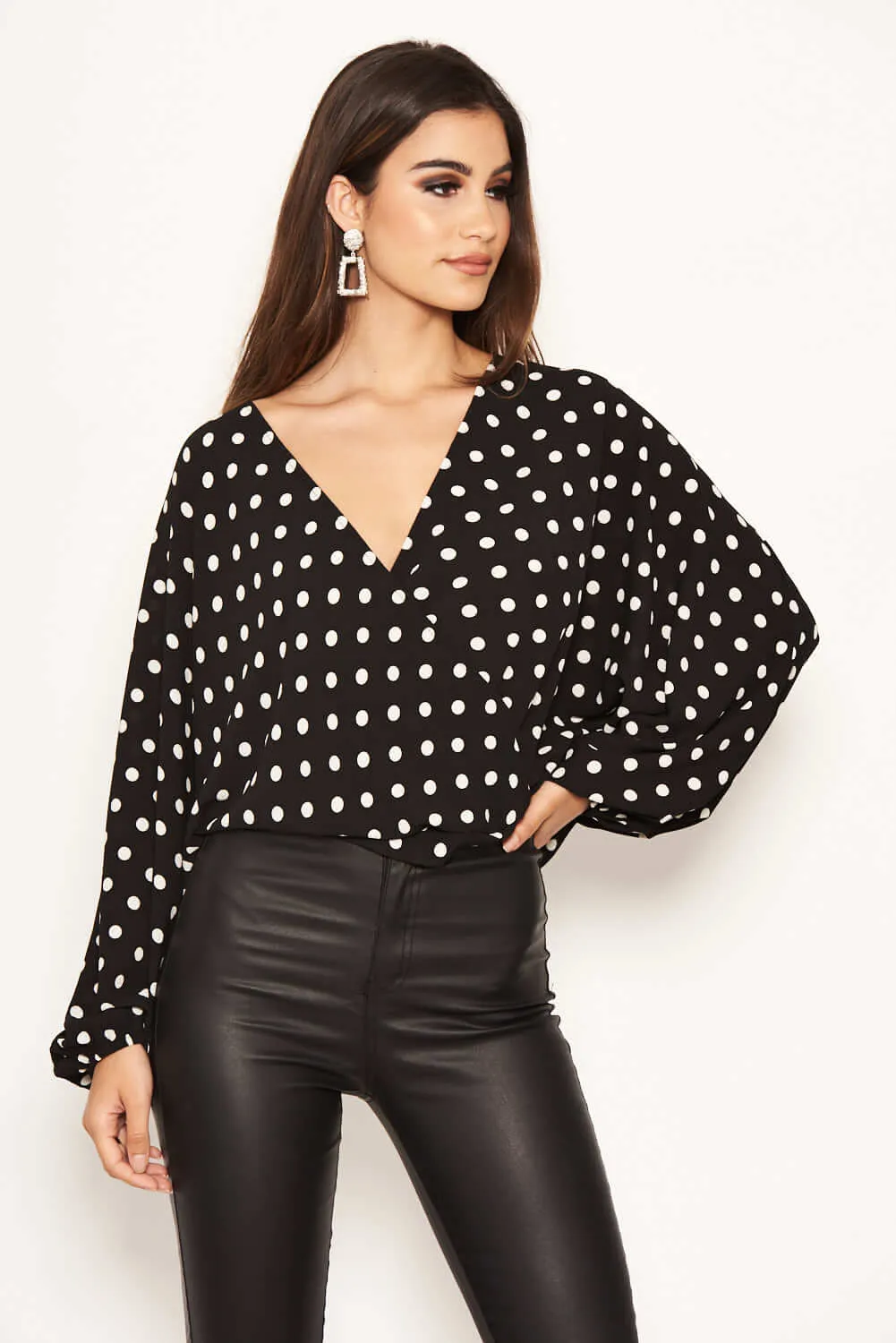 Black Polka Dot Wrap Top sold by AX Paris