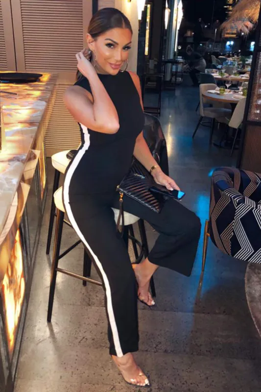 Black High Neck Jumpsuit With White Panel Detail sold by AX Paris