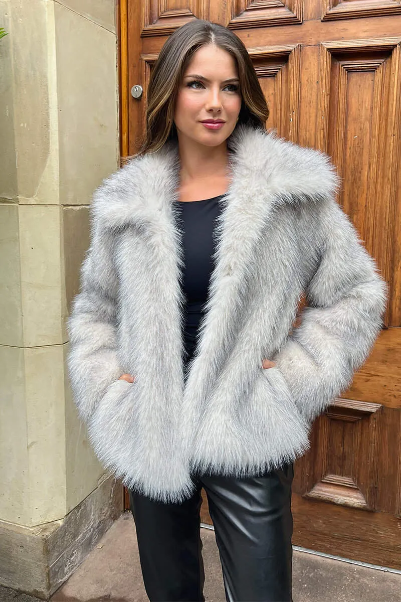 Cream Tipped Faux Fur Short Jacket sold by AX Paris