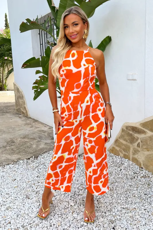 Orange Giraffe Print Strappy Racer Neck Jumpsuit sold by AX Paris