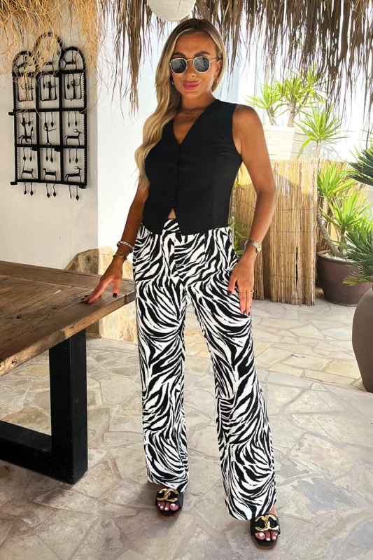 Black And White Zebra Print Wide Leg Trousers sold by AX Paris
