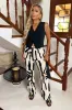 Cream And Black Abstract Print Wide Leg Trousers sold by AX Paris