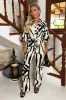 Cream And Black Abstract Print Wide Leg Trousers sold by AX Paris