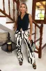 Cream And Black Abstract Print Wide Leg Trousers sold by AX Paris