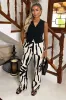 Cream And Black Abstract Print Wide Leg Trousers sold by AX Paris