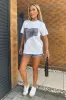 White Graphic Blue Denim Print T-Shirt sold by AX Paris