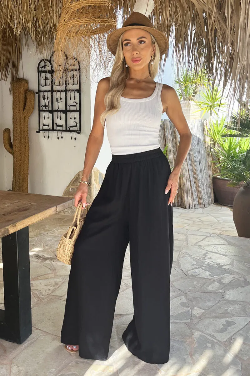 Black High Waist Palazzo Trousers sold by AX Paris