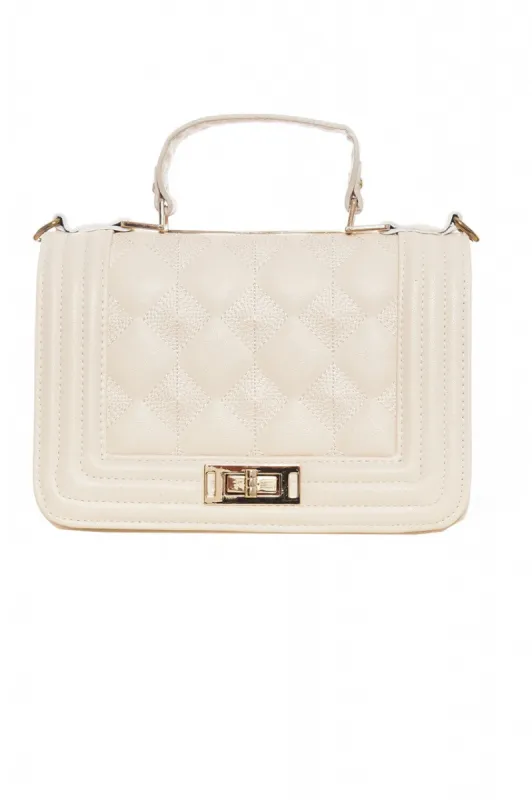 Nude Mini Quilted Handbag sold by AX Paris