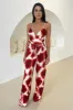 Rust Printed Strappy Tie Waist Jumpsuit sold by AX Paris