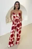 Rust Printed Strappy Tie Waist Jumpsuit sold by AX Paris