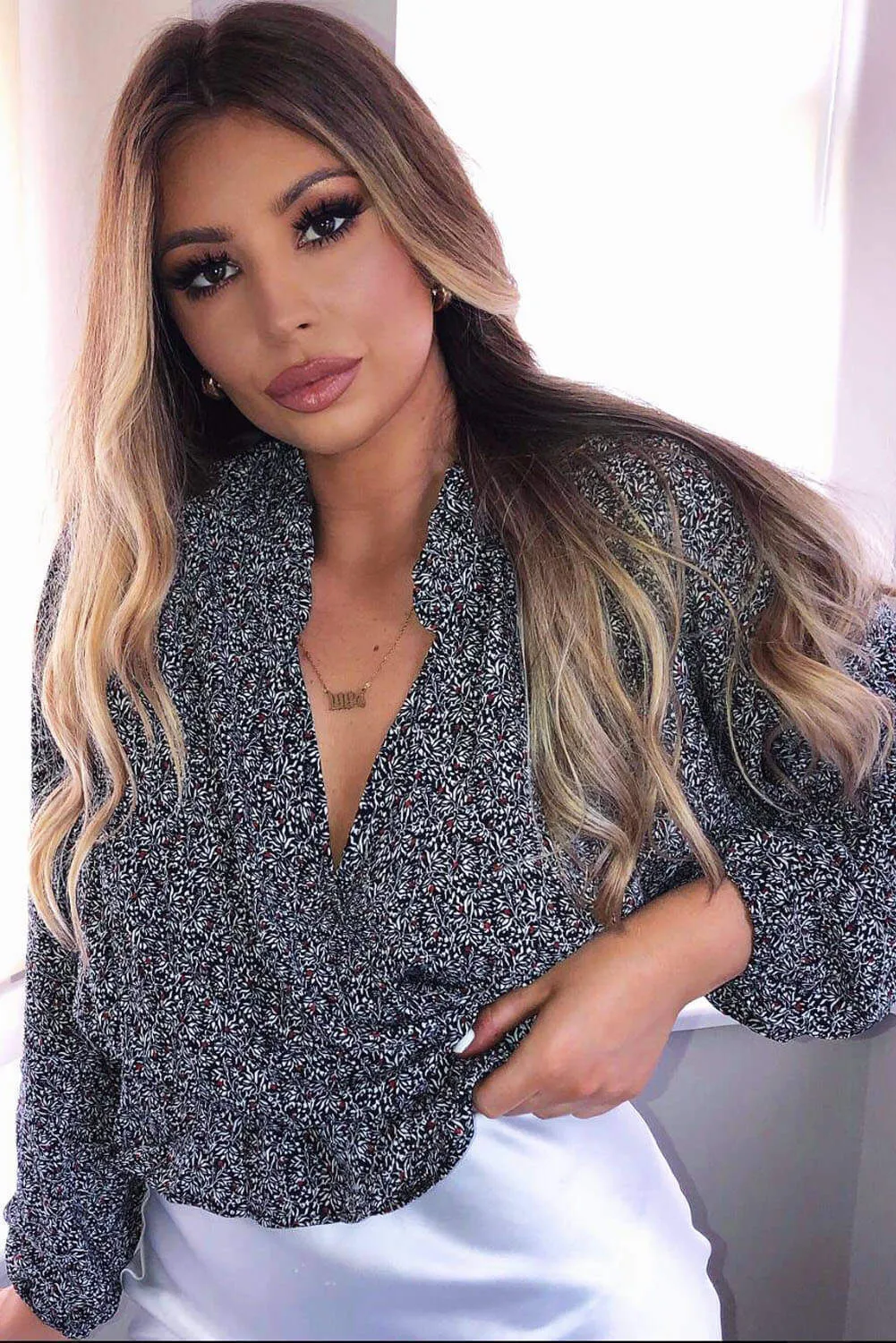 Black Printed Wrap Over Top sold by AX Paris