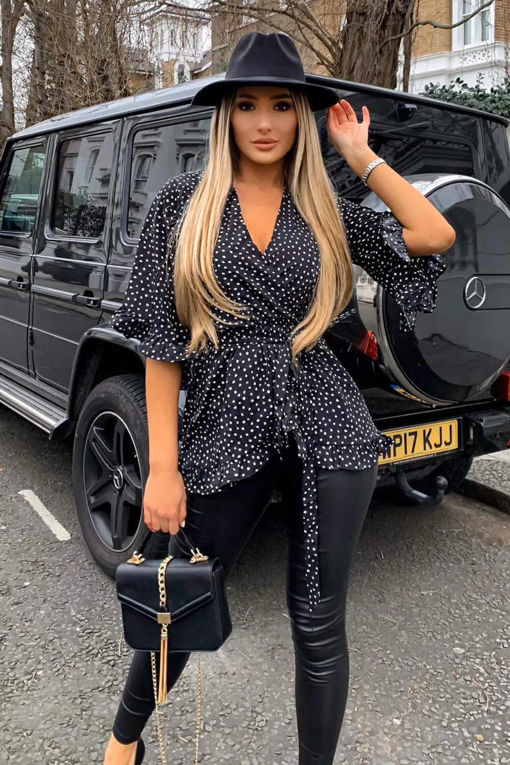 Black Frill Spotted Wrap Top sold by AX Paris