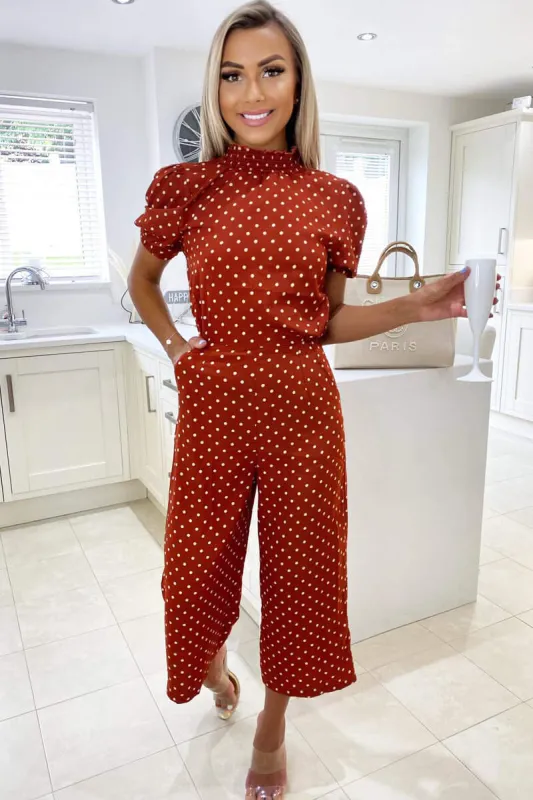 Rust Polka Dot High Neck Culotte Jumpsuit sold by AX Paris