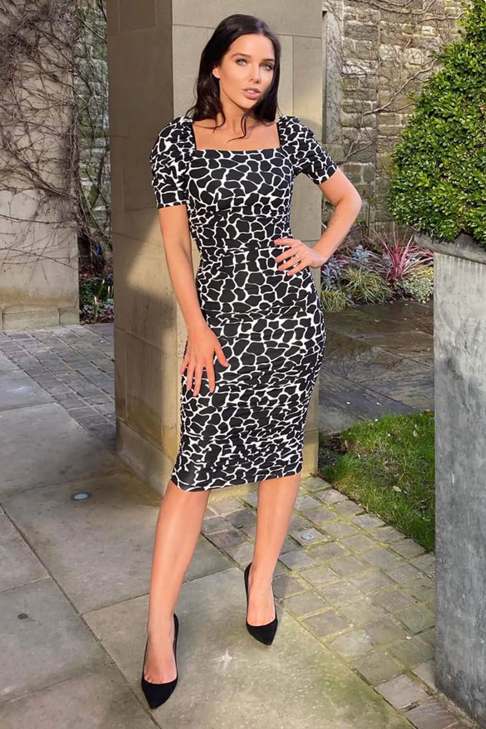 Black Printed Ruched Puff Sleeve Midi Dress sold by AX Paris