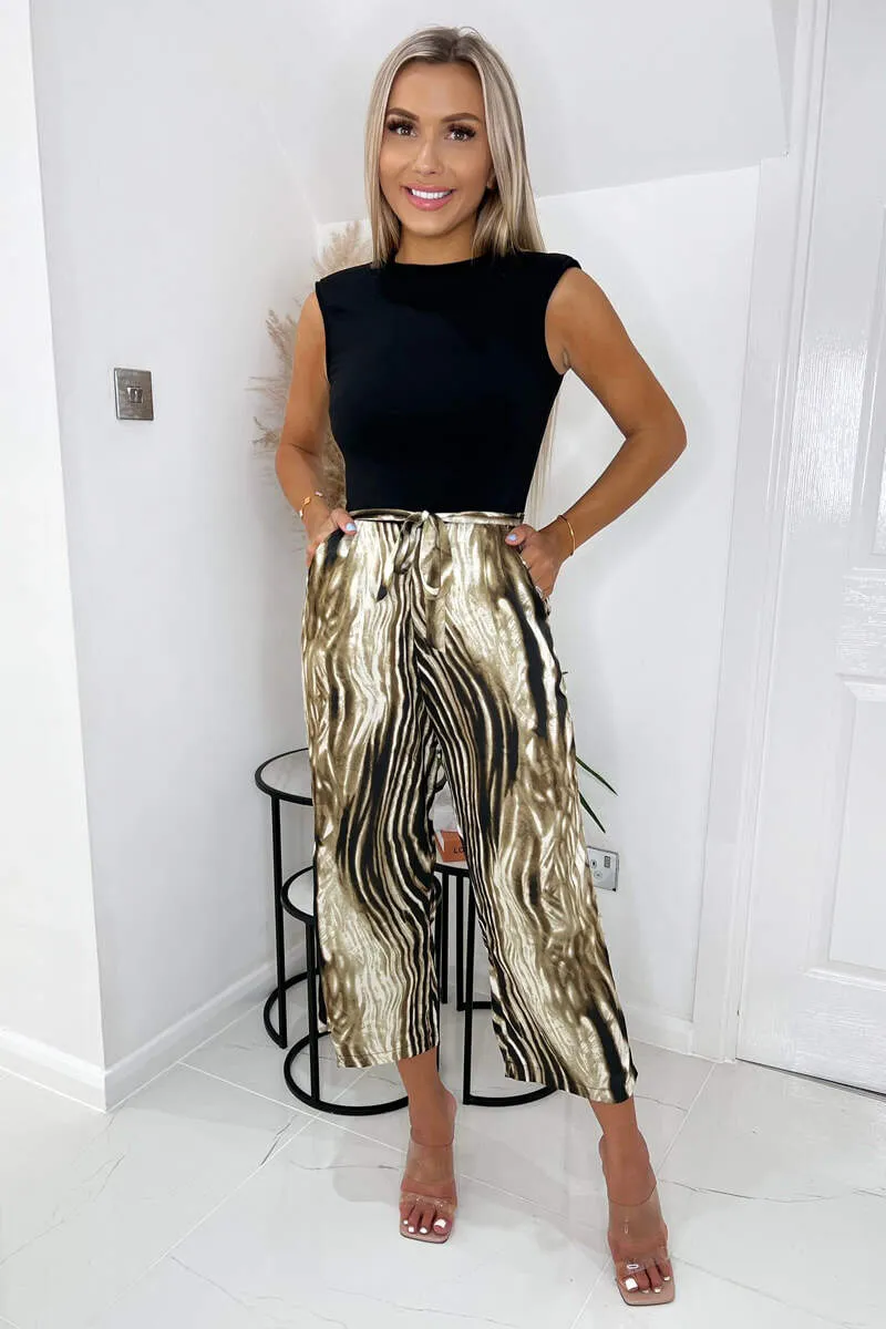 Brown Printed 2 In 1 Tie Belt Jumpsuit sold by AX Paris