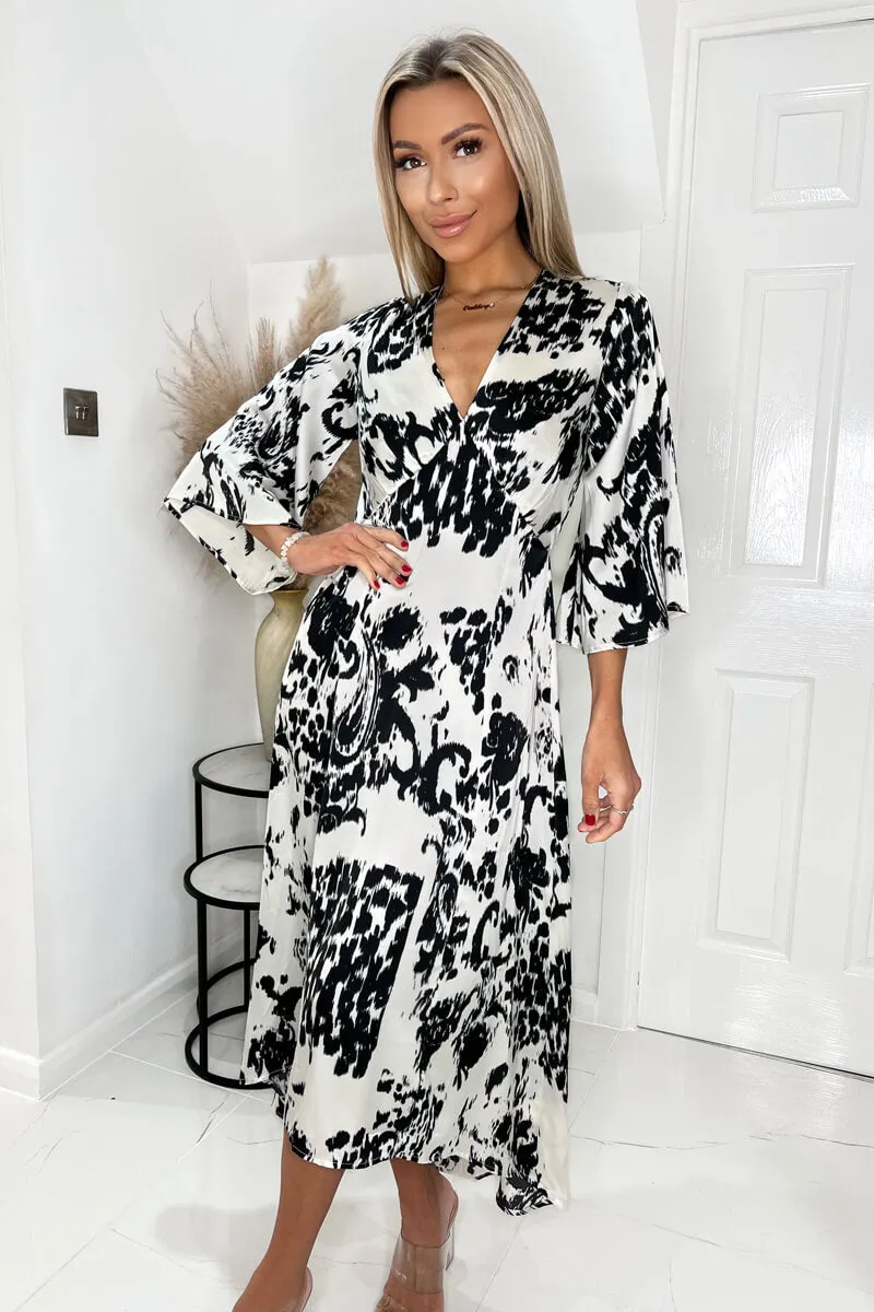 Black And Cream Printed V Neck Bell Sleeve Midi Dress sold by AX Paris product image thumbnail 2