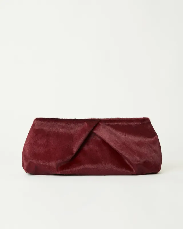 JINO CALF-HAIR CLUTCH sold by B-Low the Belt