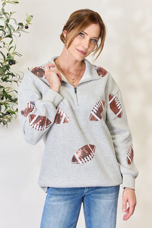 Double Take Full Size Sequin Football Half Zip Long Sleeve Sweatshirt sold by Back2Basics
