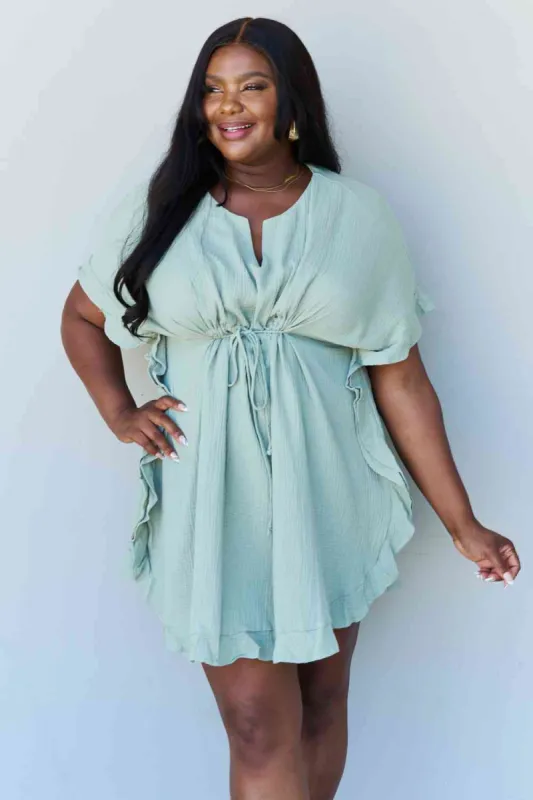 Ninexis Out Of Time Full Size Ruffle Hem Dress with Drawstring Waistband in Light Sage sold by Back2Basics