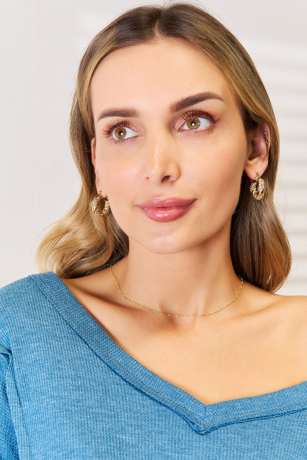 Adored Rhinestone Twist Detail Hoop Earrings sold by Back2Basics product image thumbnail 3