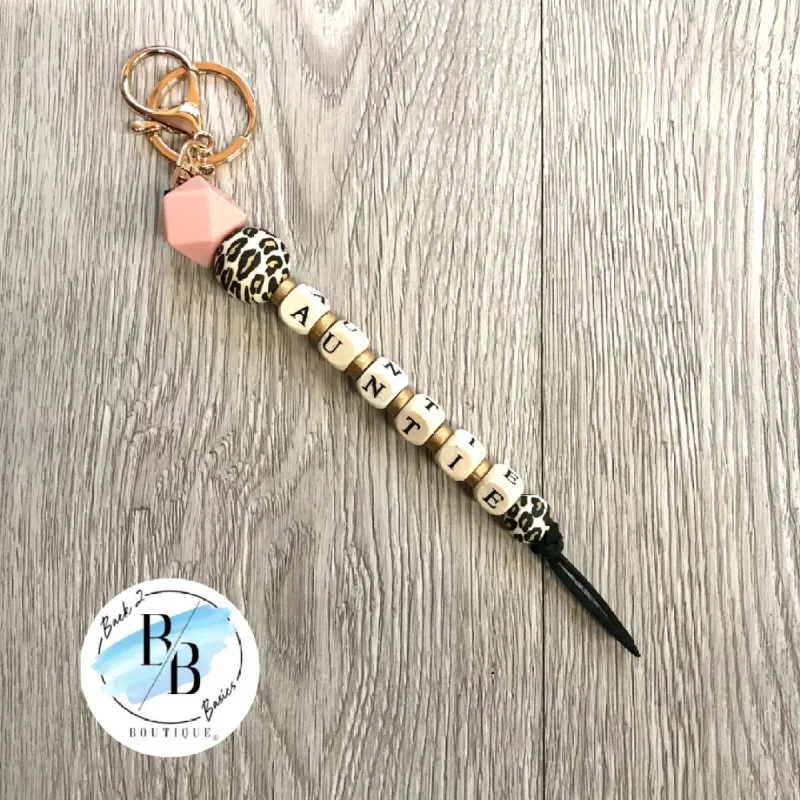 Black Leopard Beaded Auntie Tassel Keychain sold by Back2Basics
