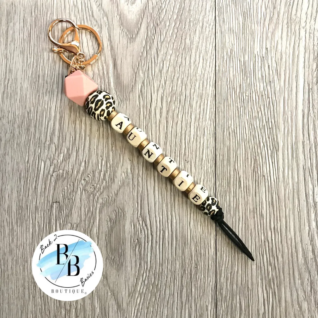 Black Leopard Beaded Auntie Tassel Keychain sold by Back2Basics
