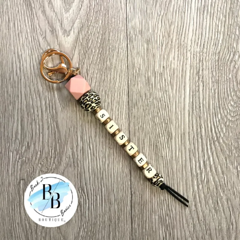 Black Leopard Beaded Sister Tassel Keychain sold by Back2Basics