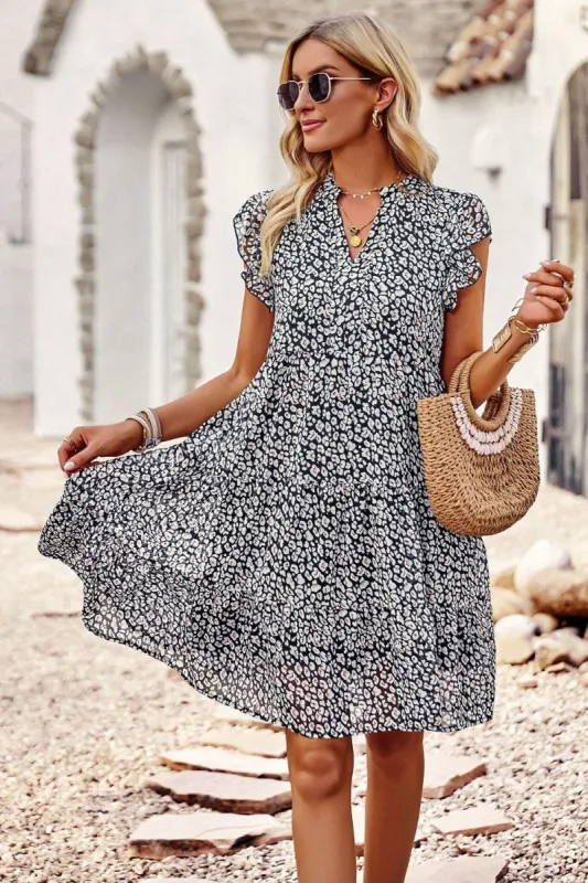 Floral Flutter Sleeve Notched Neck Tiered Dress sold by Back2Basics